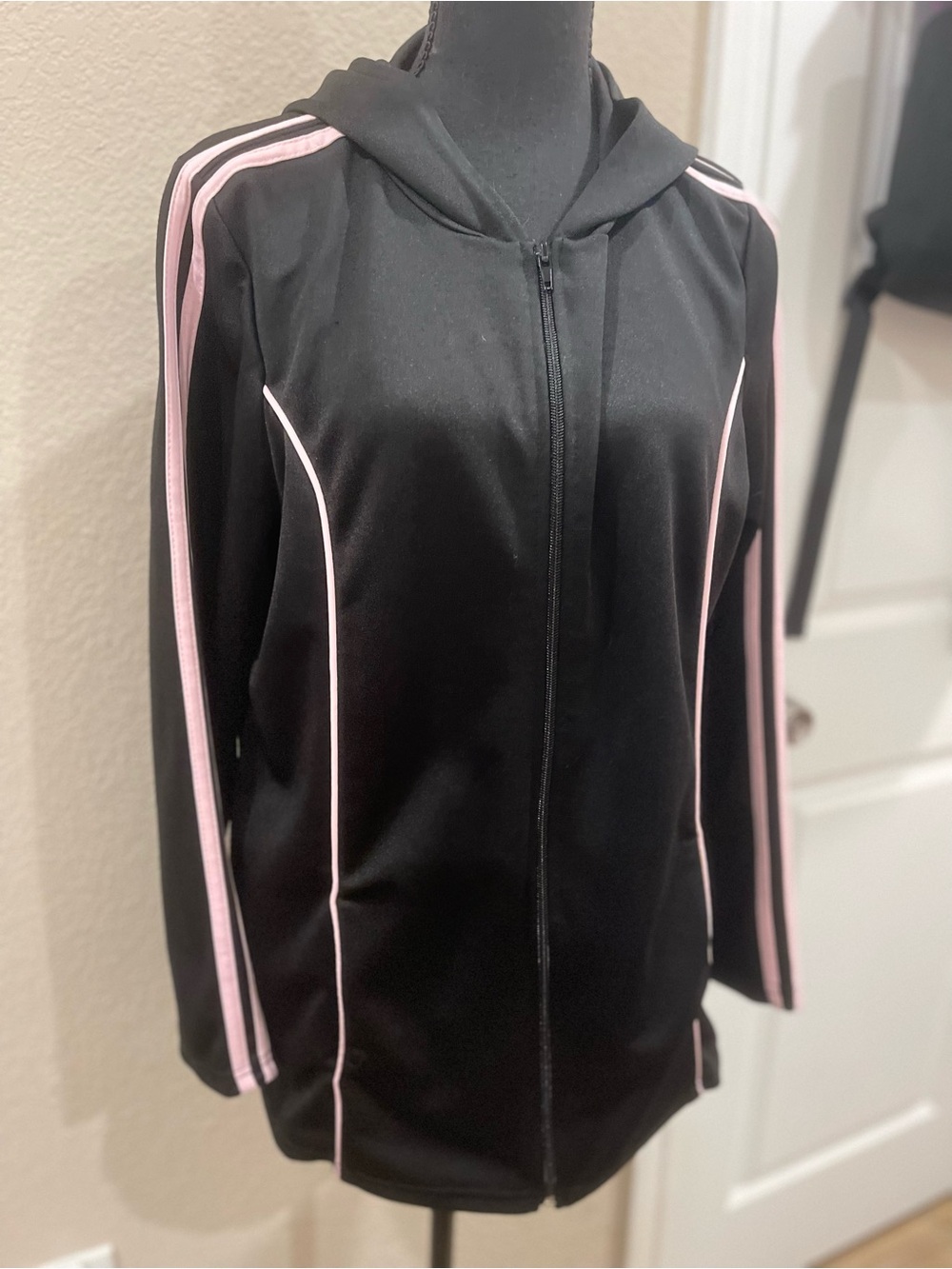Black Hooded Track Jacket with Stripe Accents and Hidden Pockets in Seams